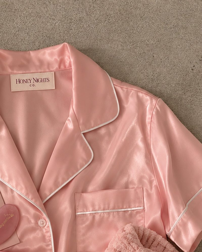Close-up of satin collar with Honey Nights Co. label